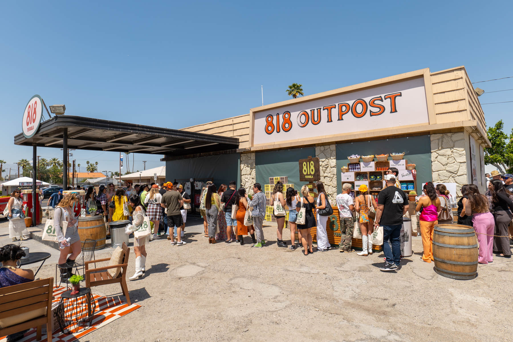 Guests lining up to receive merchandise and goodie bags from the 818 Outpost.