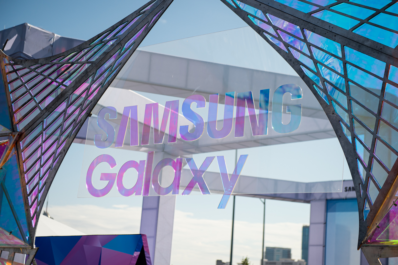 A holographic Samsung Galaxy logo.