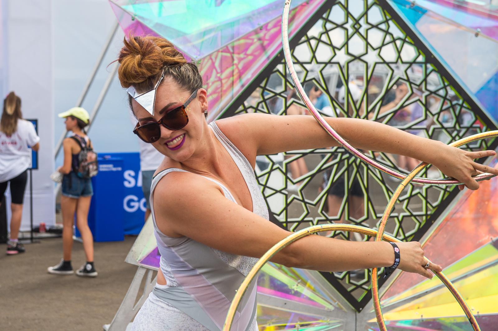 A performer dancing with hoops.