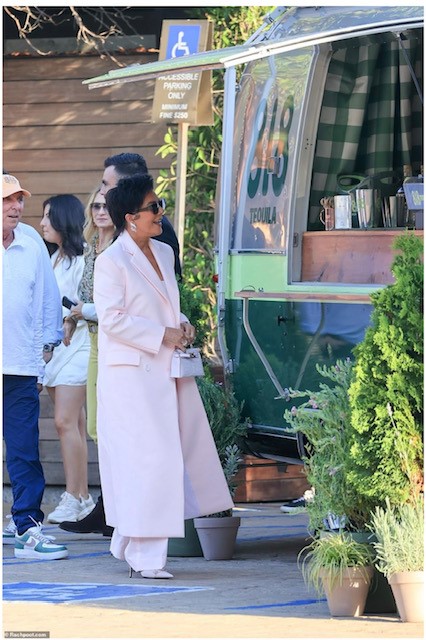 Kris Jenner approaching the 818 Airstream.