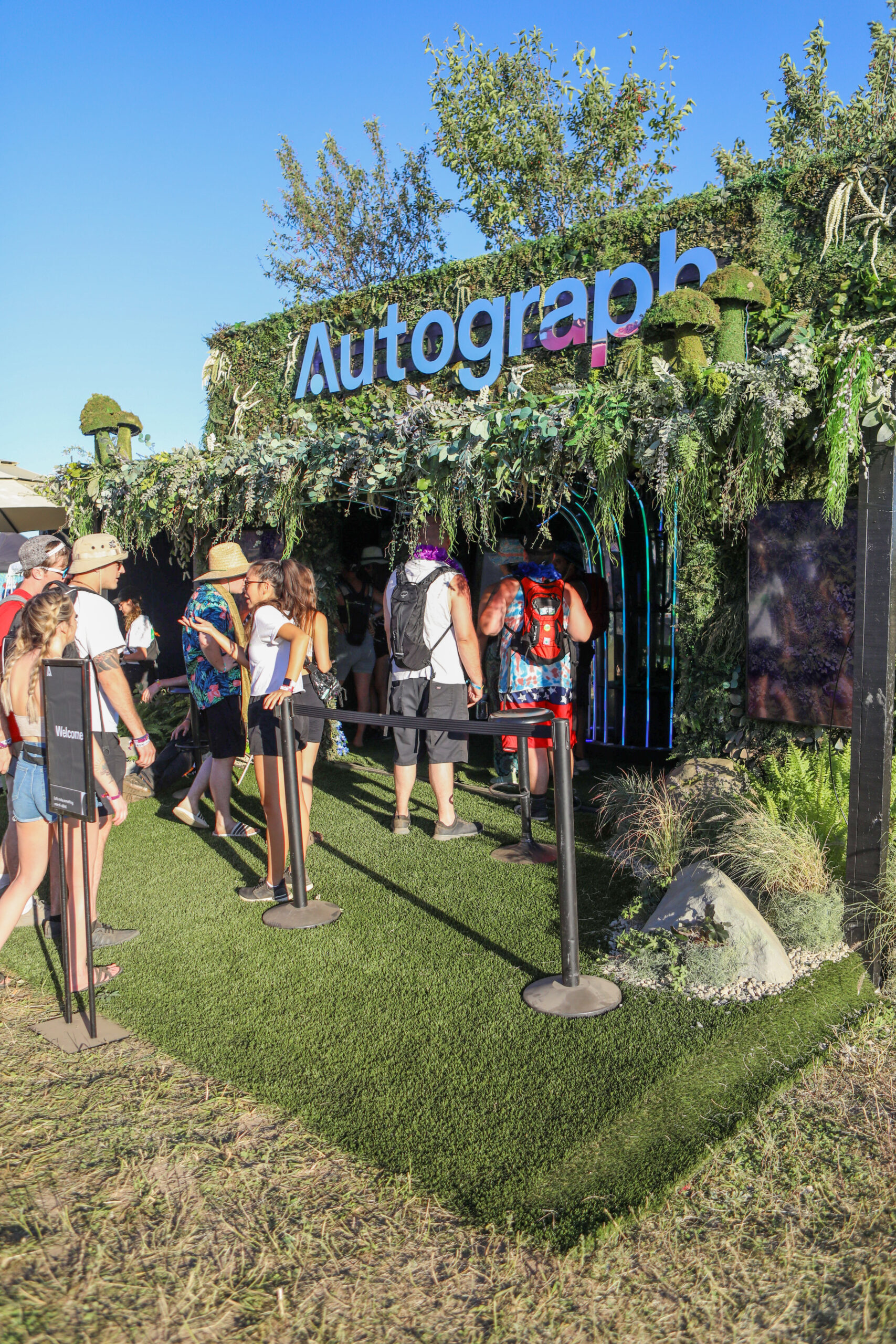 Guests entering the Autograph container at Electric Forest.